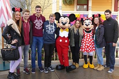 <p>Posing with Mickey and Minnie!</p>